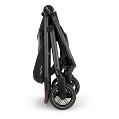 Coche Nuna Swiv Caviar Reversible